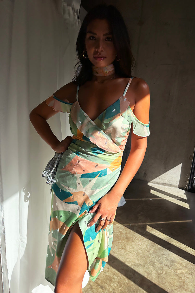caption_Model wears Sage Lyra Jaspre Wrap Skirt in UK size 10/ US 6
