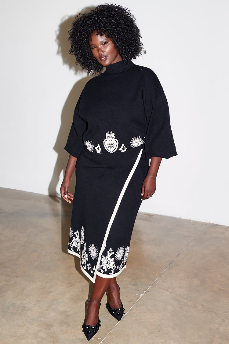 Model wearing Black Virgo Jumper 