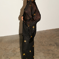 Thumbnail for Model wearing Black with Gold Palm Fleck Trousers