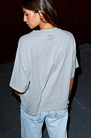 Thumbnail for Model wearing Grey Running Wild T-Shirt With Silver Foil