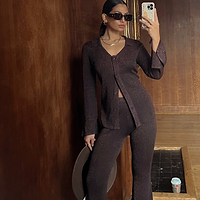 Thumbnail for Model wearing Bronze Sparkle Trousers standing facing the camera