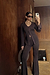 Model wearing Bronze Sparkle Trousers standing facing the camera