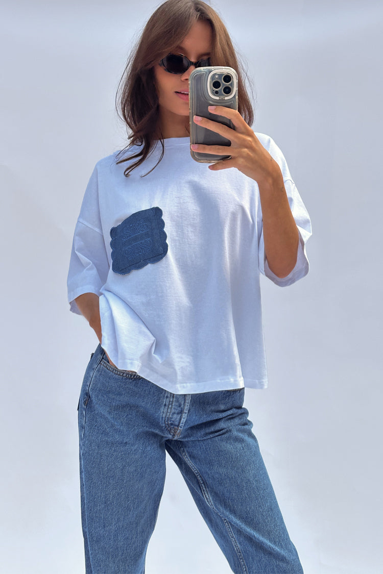 caption_Model wears  White Denim Pocket T-shirt in UK size 10/ US 6