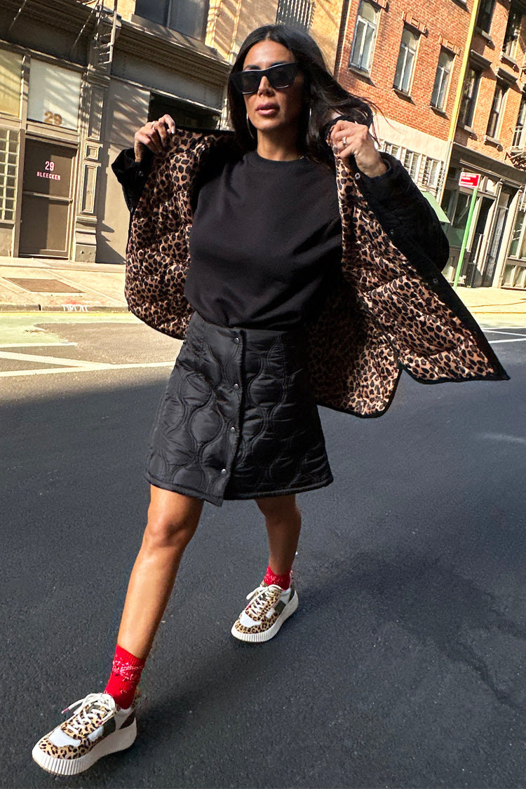 model wearing Black Quilted Skirt
