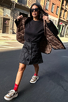 Thumbnail for model wearing Black Quilted Skirt