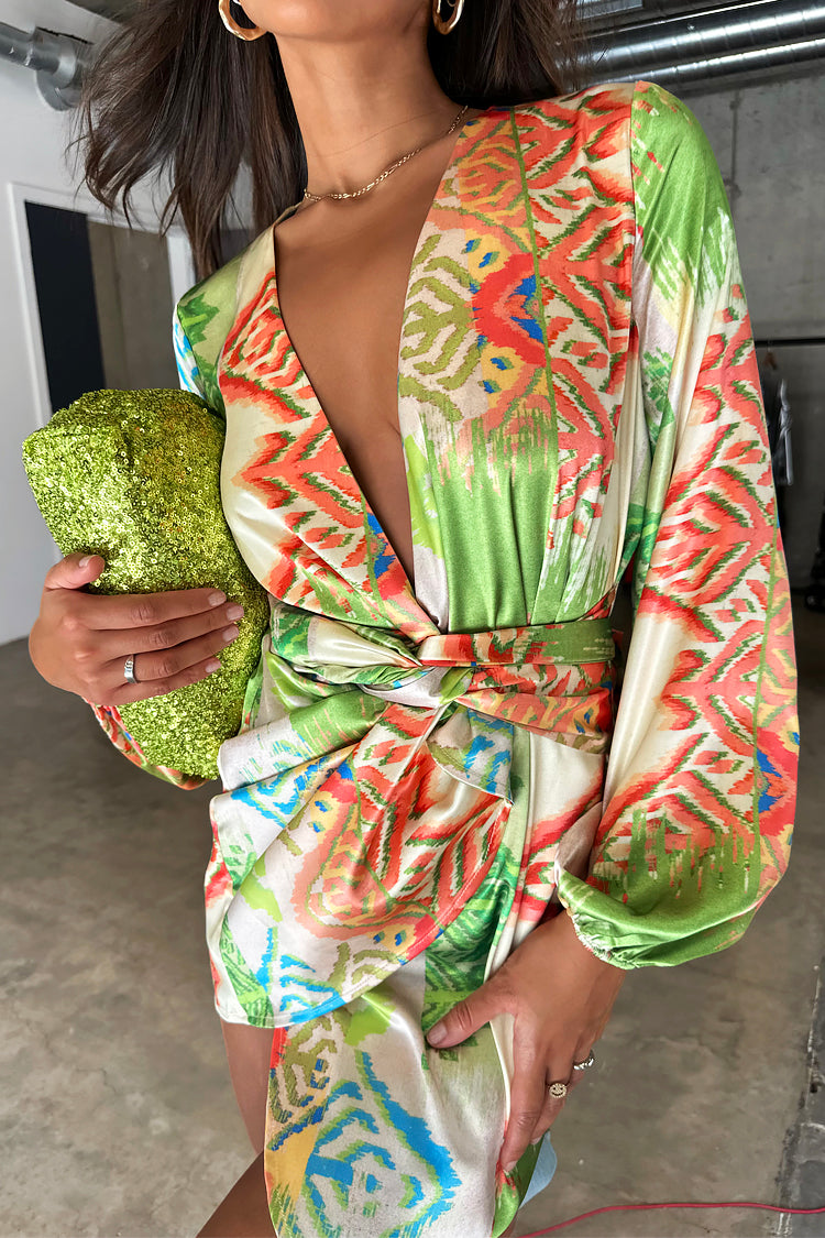 caption_Model wears Green Abstract Mini Vienna in UK size 10/ US 6