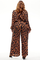 Thumbnail for Model wearing Animal Jumpsuit standing facing away from the camera