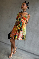Thumbnail for caption_Model wears Fiji Antonia Mini Dress in UK size 10/ US 6