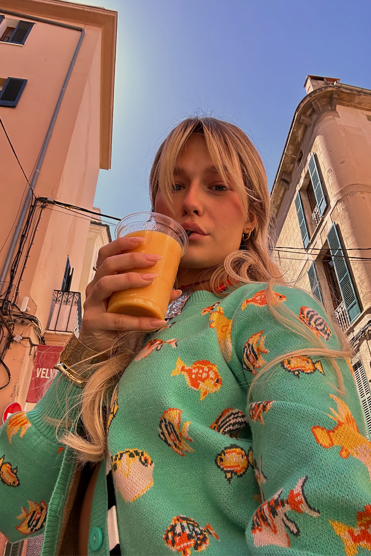 caption_Model wears Atlantis Cardigan in UK size 10/ US 6