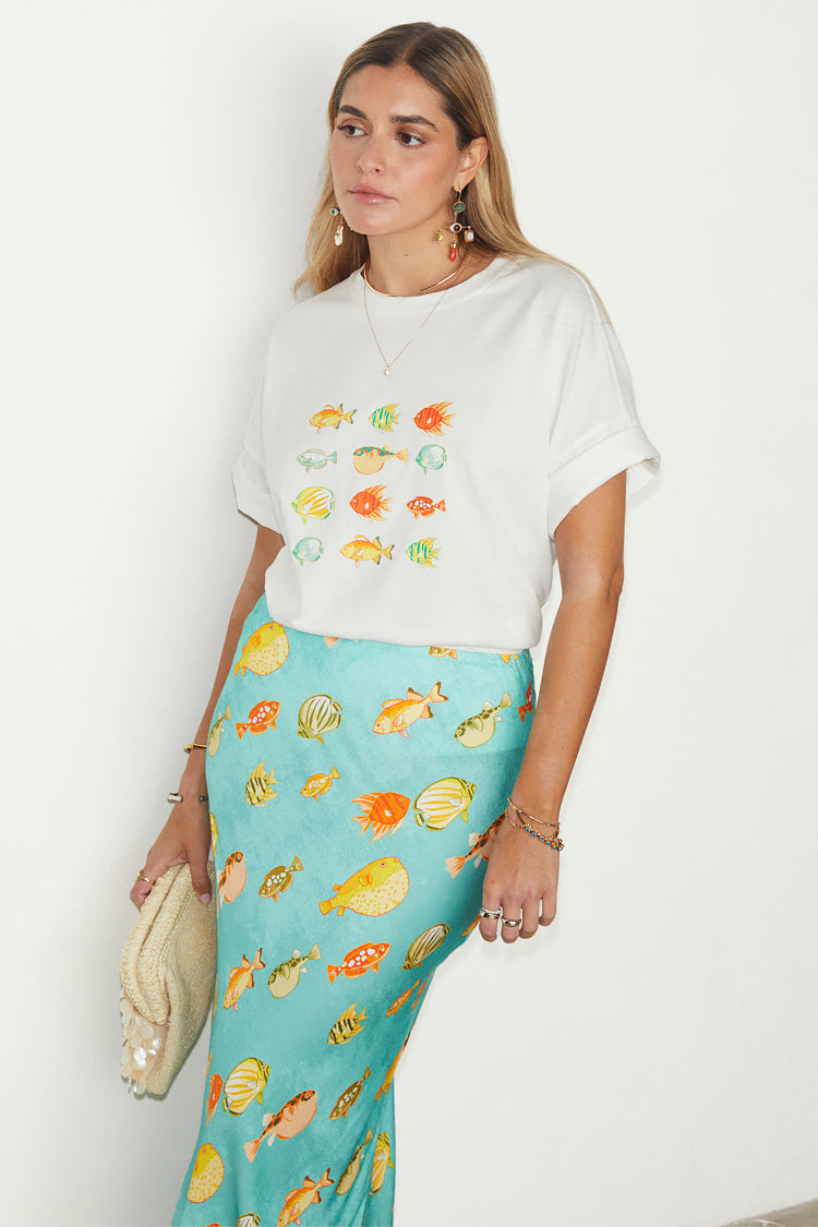 caption_Model wears Atlantis Dorris Skirt in UK size 10/ US 6