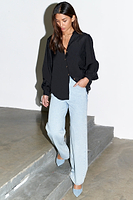 Thumbnail for caption_Model wears Black Miley Shirt in UK size 8/ US 4
