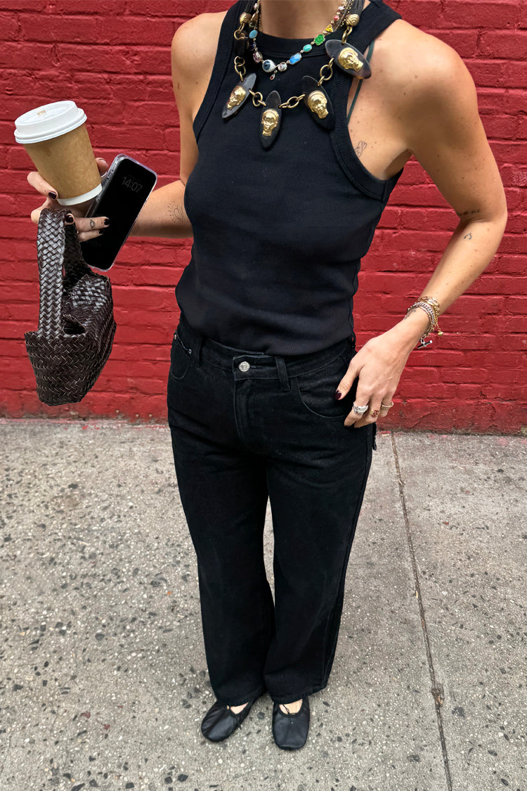 caption_Model wears Black Scallop Detail Jeans in UK size 10/ US 6
