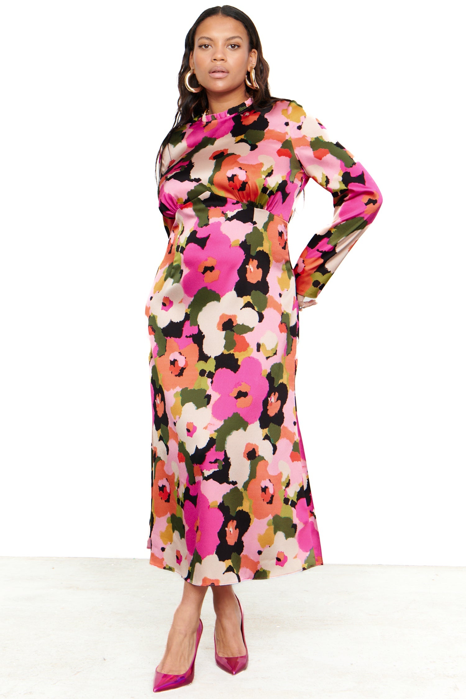 Model wearing Winter Blossom Beau Dress standing facing the camera