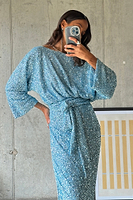 Thumbnail for caption_Model wears Blue Sequin Tilly Top in UK size 10/ US 6