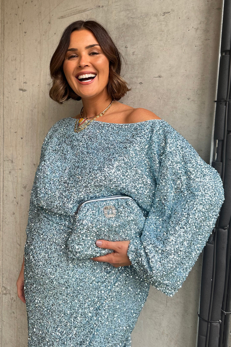 caption_Model wears Blue Sequin Tilly Top in UK size 18/ US 14