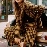 Thumbnail for Model wearing Check Blazer sitting facing the camera 