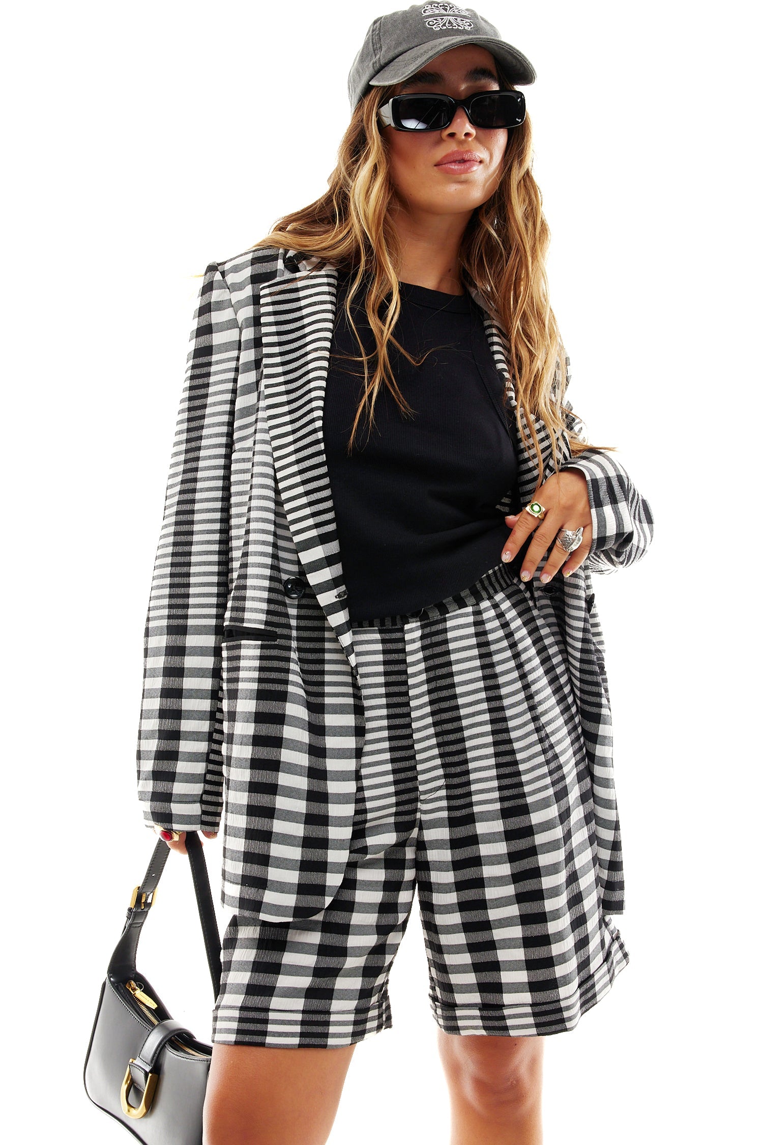Model wearing Mono Check Culotte Shorts standing facing the camera