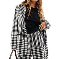 Thumbnail for Model wearing Mono Check Culotte Shorts standing facing the camera