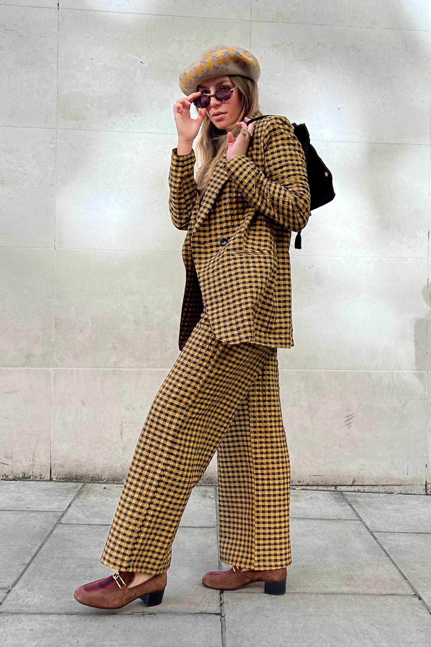 Model wearing Check Blazer standing facing the side