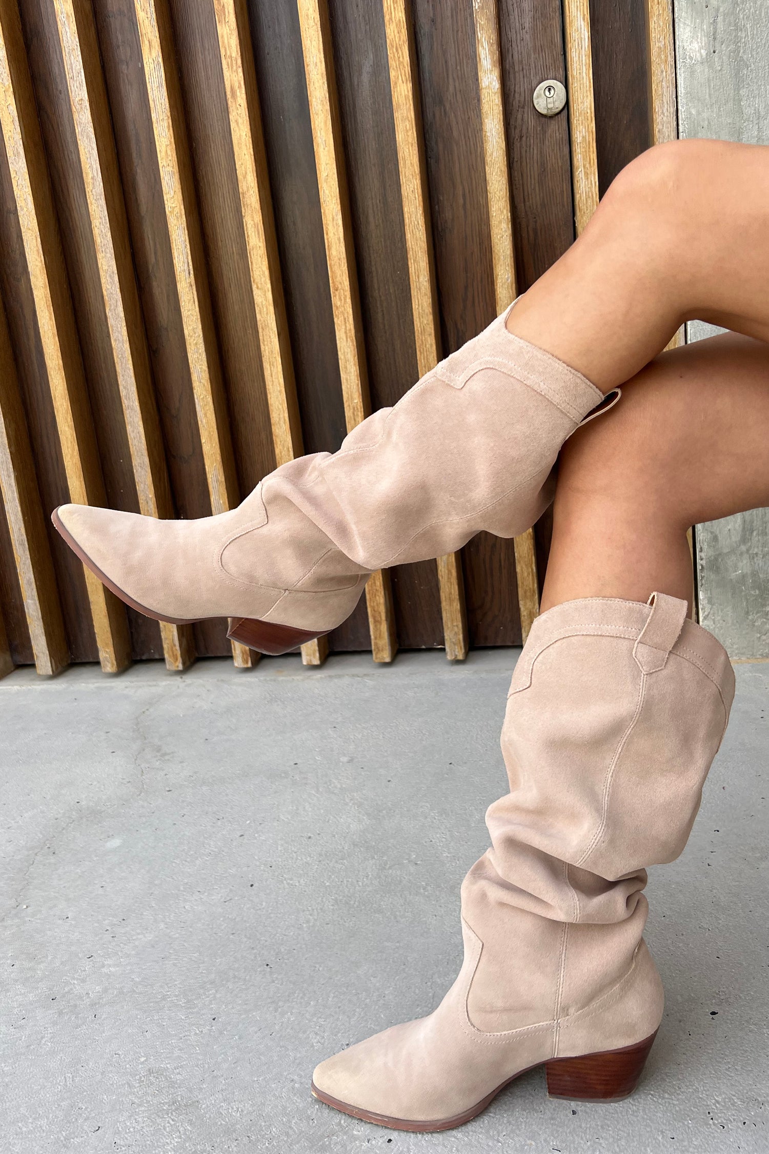 Model wearing Suede Cowboy Boot close up