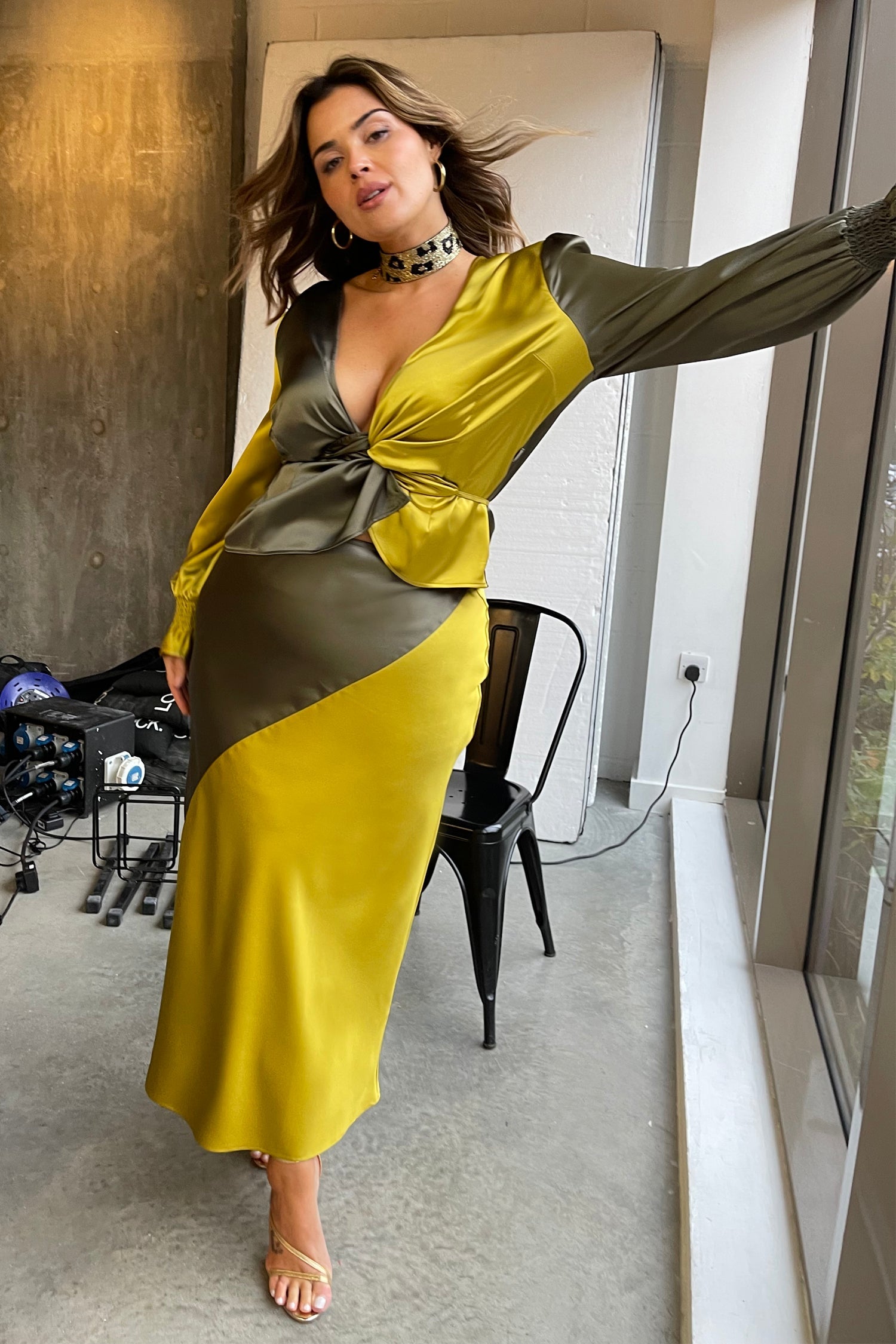 Model wearing Lime and Khaki Emmy Skirt standing facing the camera