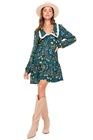 Thumbnail for Model wearing Evelyn Mini Dress standing facing the camera