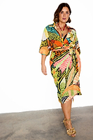 Thumbnail for caption_Model wears Fiji Midi Jaspre Wrap Skirt in UK size 18/ US 14