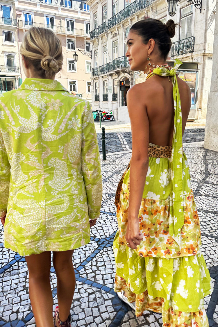 caption_Model wears Floral And Leopard Matilda Wrap Dress in UK size 10/ US 6