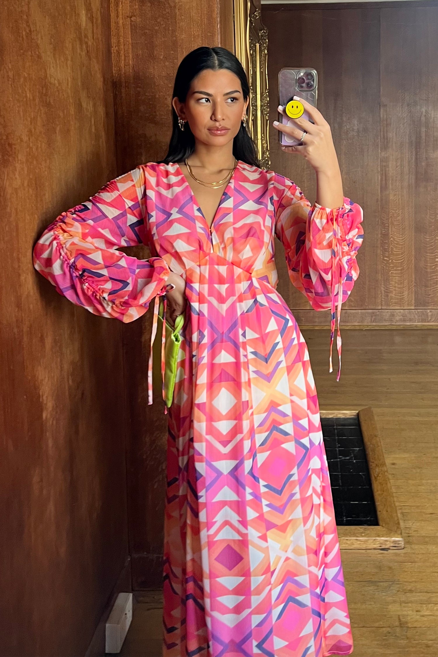 Model wearing Pink Geo Midi Dress standing facing the camera
