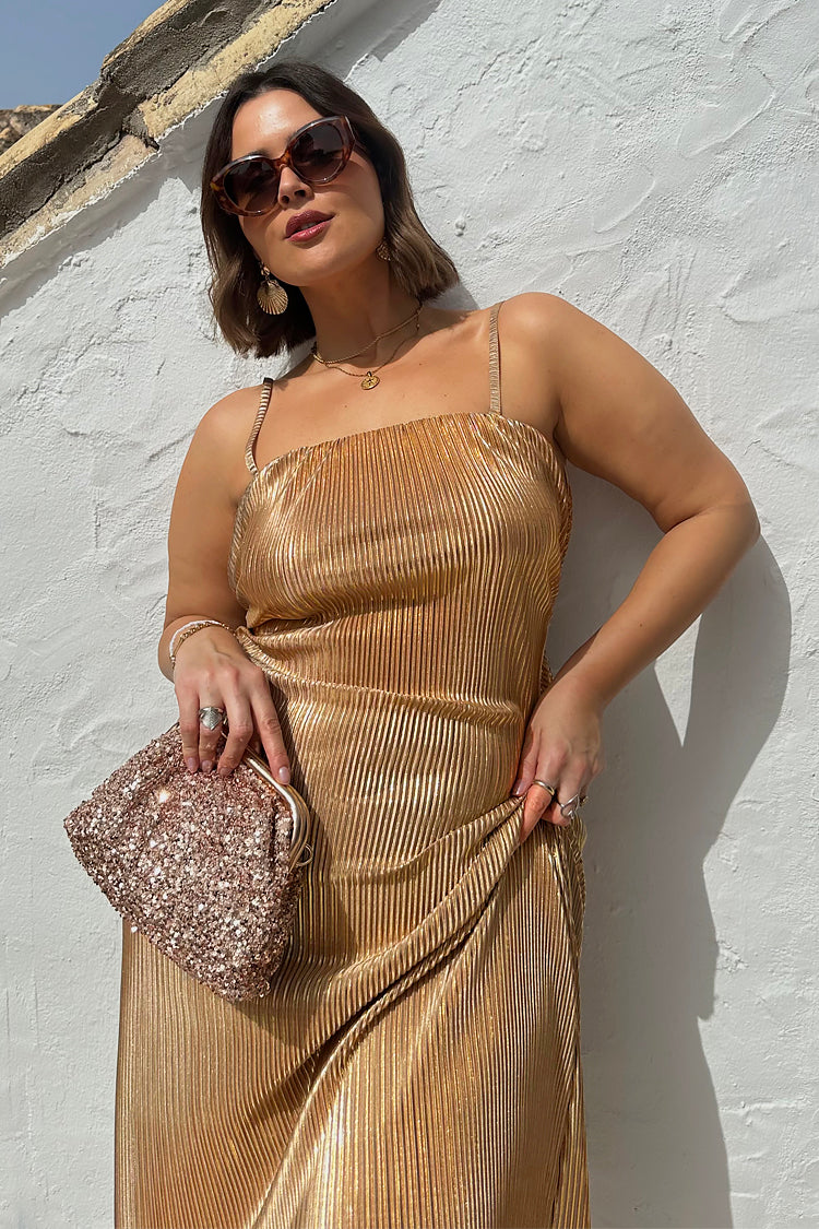 caption_Model wears Gold Plisse Luna Dress  in UK size 18/ US 14