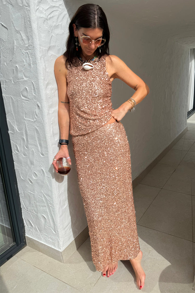 caption_Model wears Gold Sequin Dorris Skirt  in UK size 10/ US 6