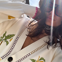 Thumbnail for caption_Model wears Cream Ibiza Martha Cardigan in UK size 10/ US 6