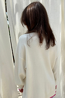 Thumbnail for caption_Model wears Cream Ibiza Martha Cardigan in UK size 10/ US 6