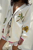 Thumbnail for caption_Model wears Cream Ibiza Martha Cardigan in UK size 10/ US 6