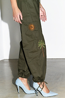 Thumbnail for caption_Model wears Khaki Running Wild Cargo Trousers in UK size 8/ US 4
