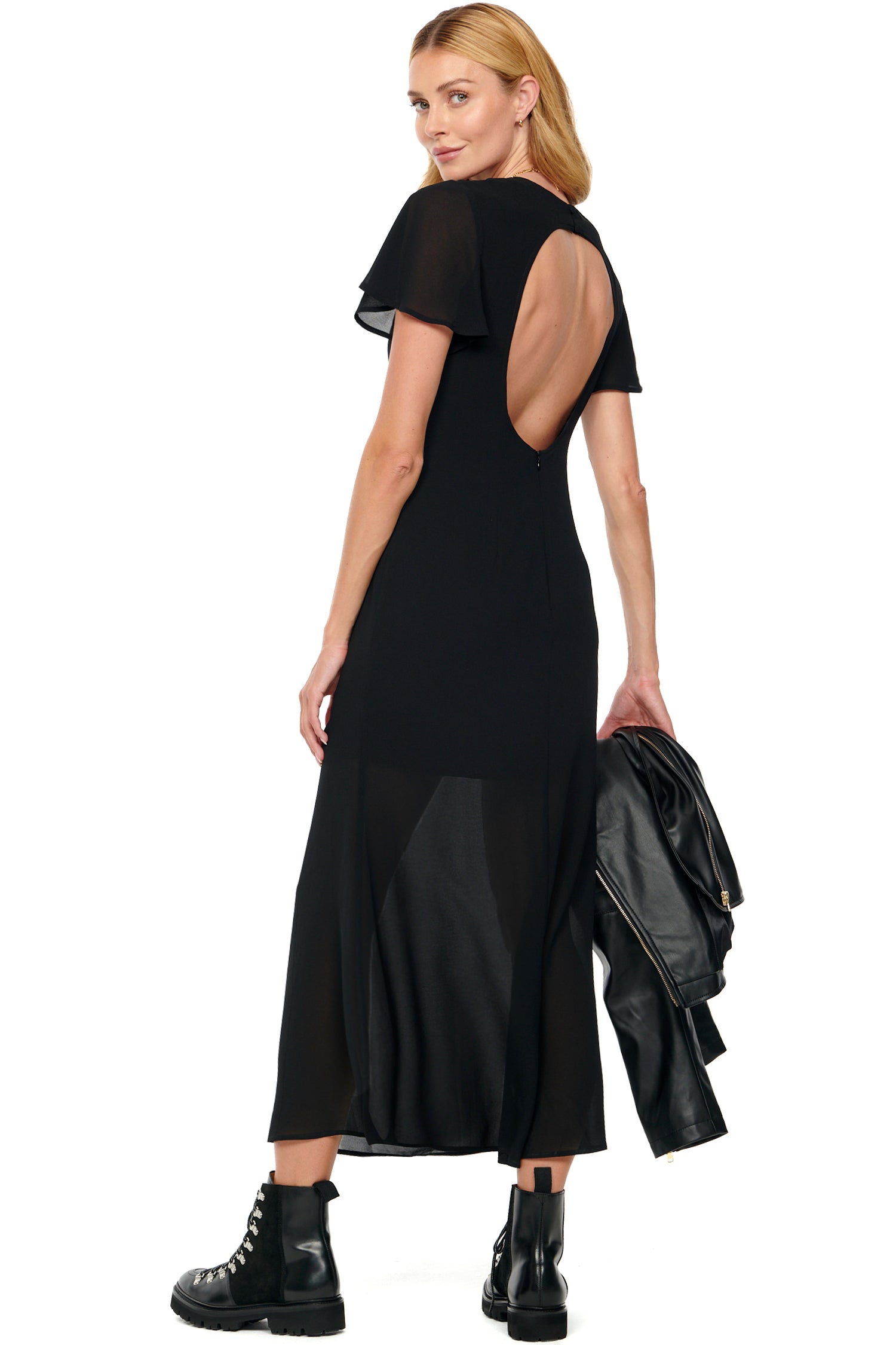Model wearing Black Leah Dress standing facing away from the camera