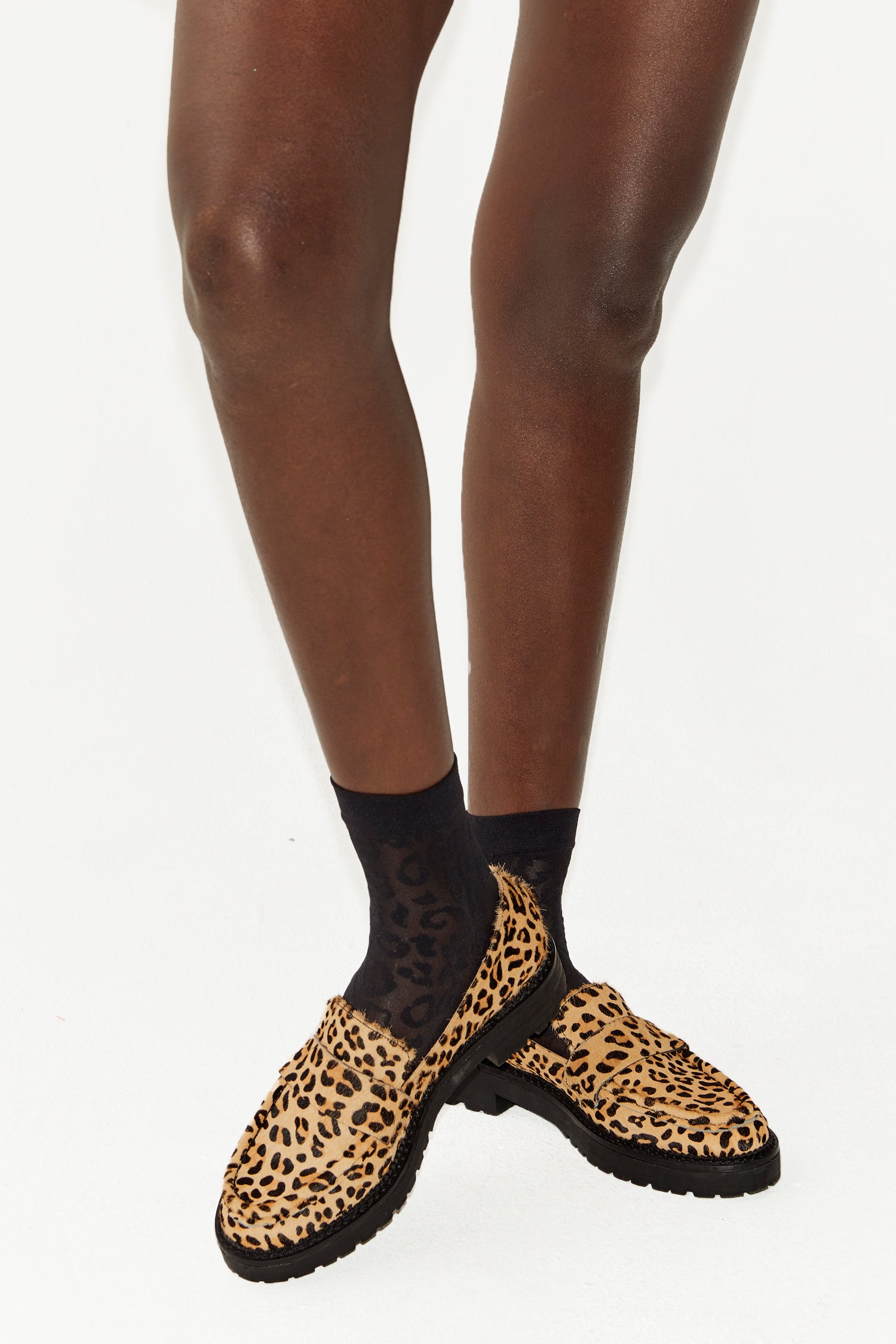 Model wearing Leopard Loafer