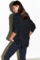 Thumbnail for caption_Model wears Black Running Wilder Sweatshirt in UK size 8/ US 4