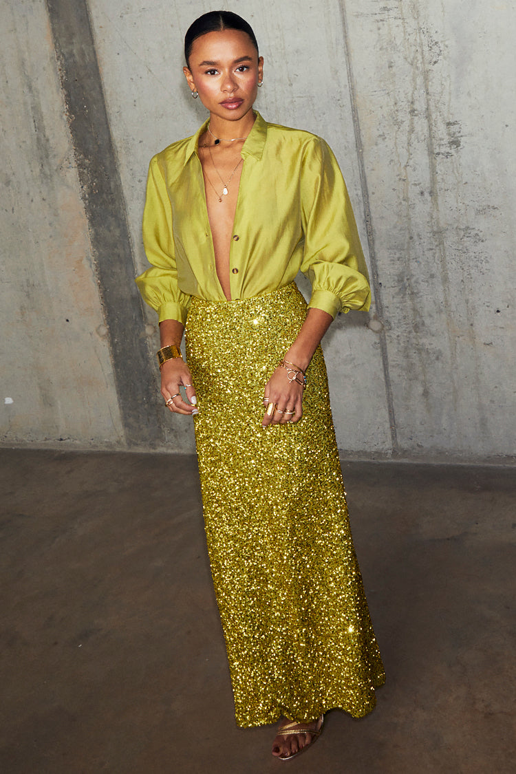 caption_Model wears Lime Sequin Dorris Skirt in UK size 10/ US 6