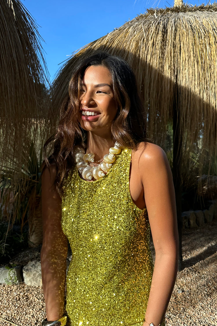 caption_Model wears Lime Sequin Tank Top  in UK size 10/ US 6