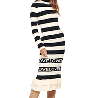 Thumbnail for Model wearing Love Ruffle Midi Dress standing facing the camera 