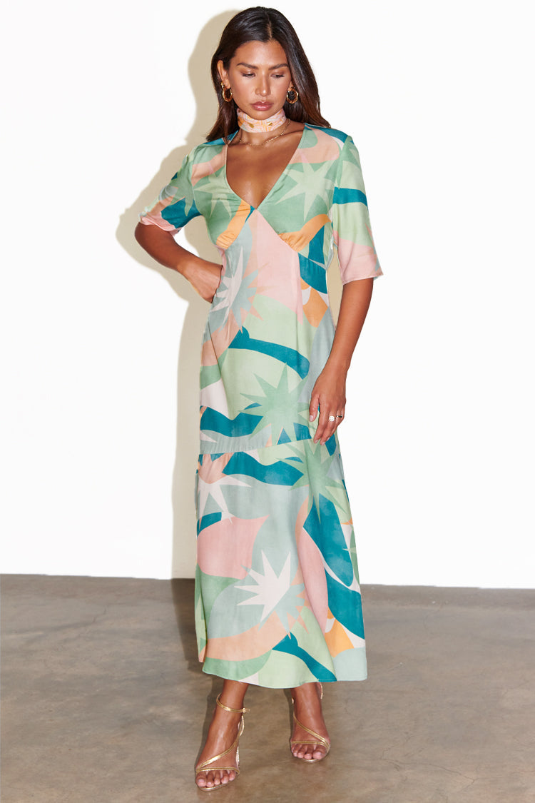 caption_Model wears Sage Lyra Poppy Midi Dress in UK size 10/ US 6