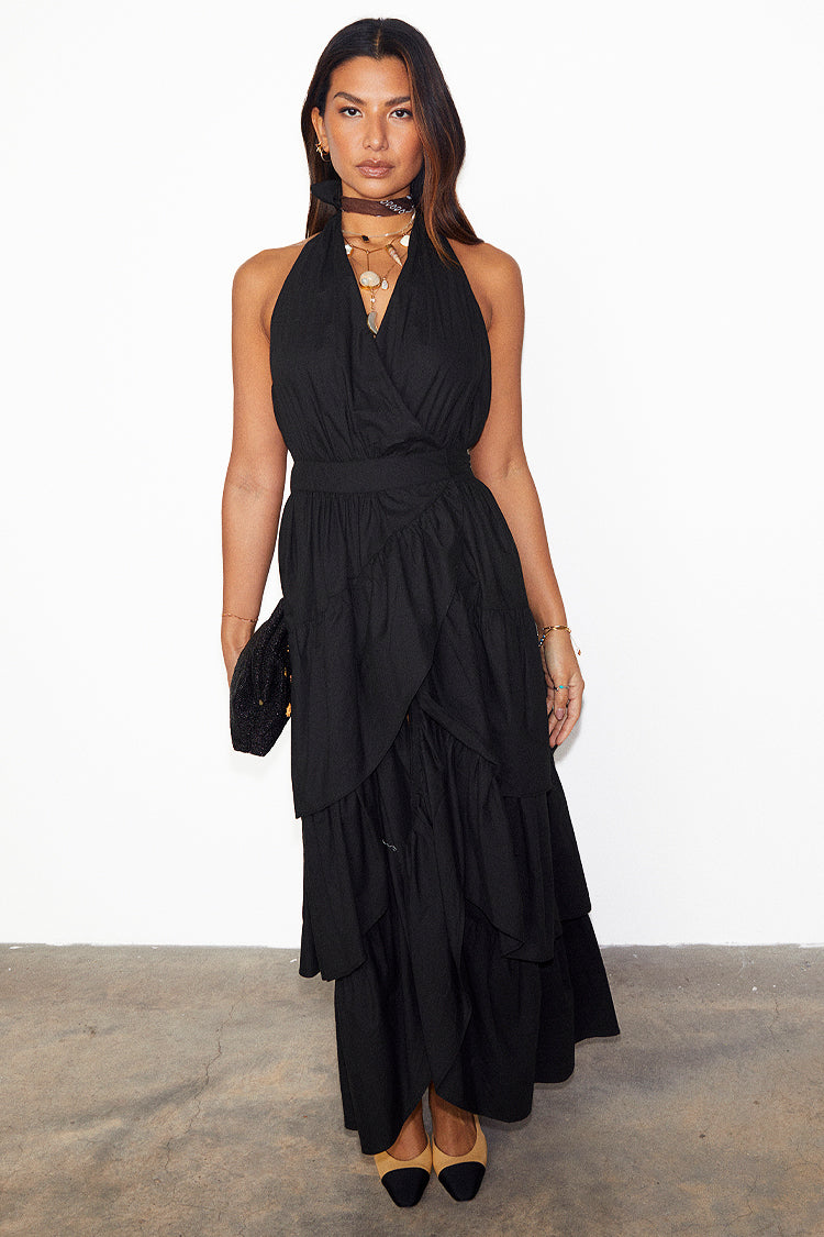 caption_Model wears Black Matilda Wrap Dress in UK size 10/ US 6