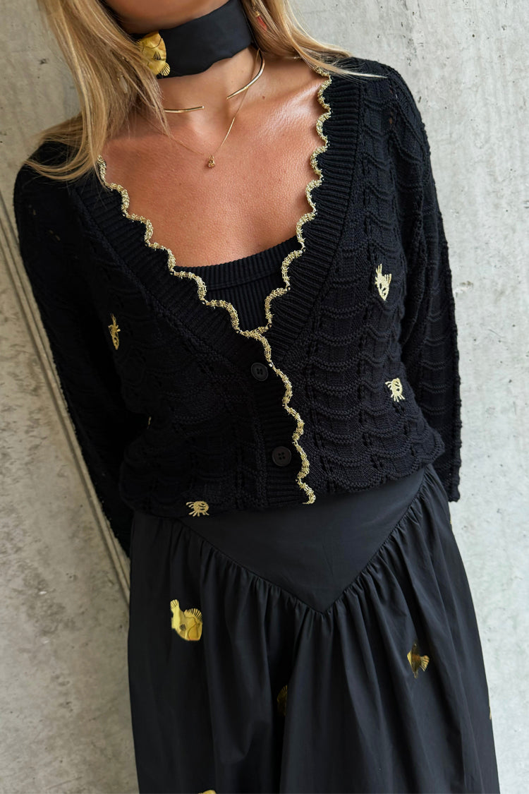 caption_Model wears Black Pointelle Knit Cardigan With Gold Fish in UK size 10/ US 6
