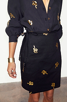 Thumbnail for caption_Model wears Black Snake Mini Wrap Skirt in UK size 10/ US 6