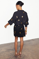 Thumbnail for caption_Model wears Black Snake Mini Wrap Skirt in UK size 10/ US 6