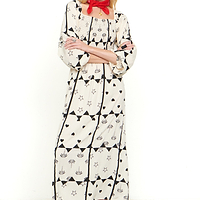 Thumbnail for Model wearing Mono Palm Jasmine Dress standing facing the camera 