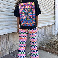 Thumbnail for Back of model wearing multi flower trousers and washed black mushroom t-shirt