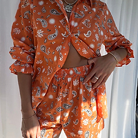 Thumbnail for caption_Model wears Orange Leopard Elissa Short in UK size 10/ US 6