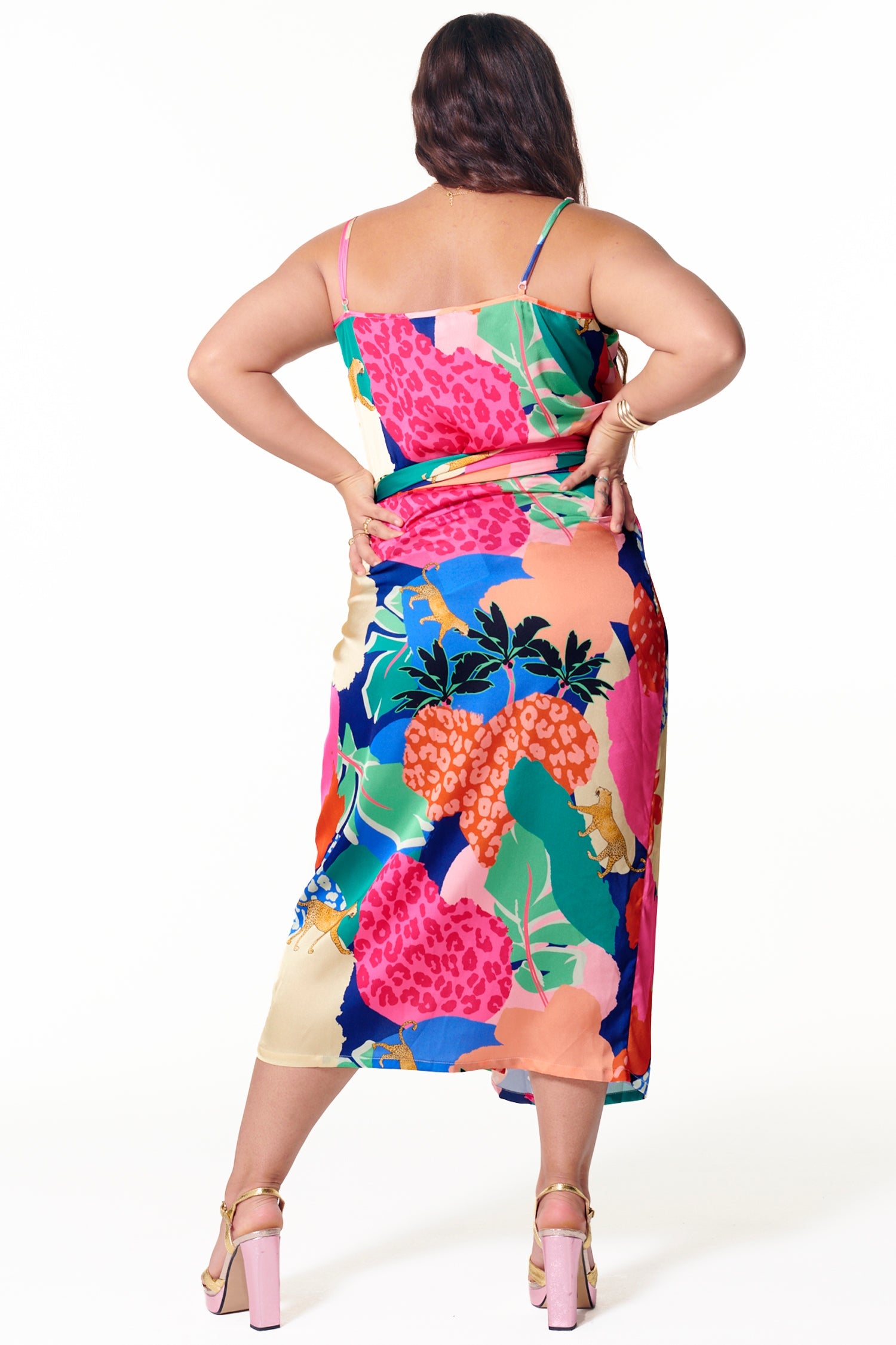 Model wearing Paradise Cami Top facing away from the camera
